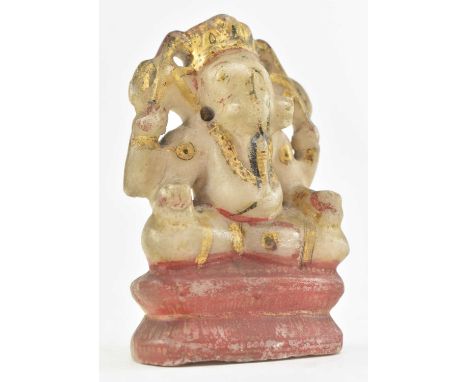 An 18th century Hindu alabaster figure amulet of the Elephant god Ganesh / Ganesha. The figure with gilt highlights &amp; sea