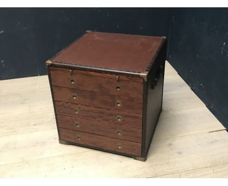 Leather and brass bound contemporary Campaign trunk of 5 drawers beneath a slide, 50cm sq.