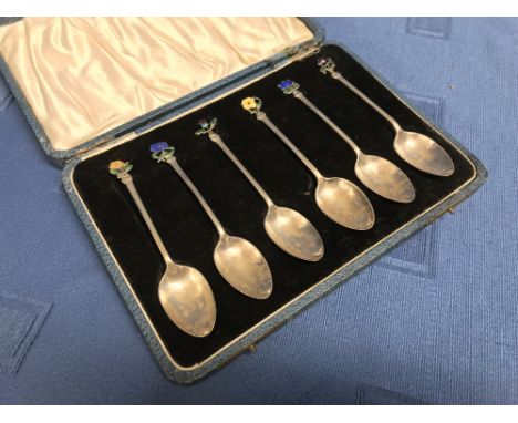 Cased set of 6 hallmarked silver teaspoons with floral enamel finials