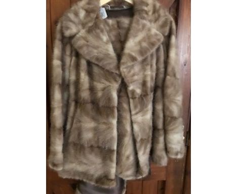 Fur coat, light tan colour with a hidden zip to add or remove a longer length as required, approx. size 10/12