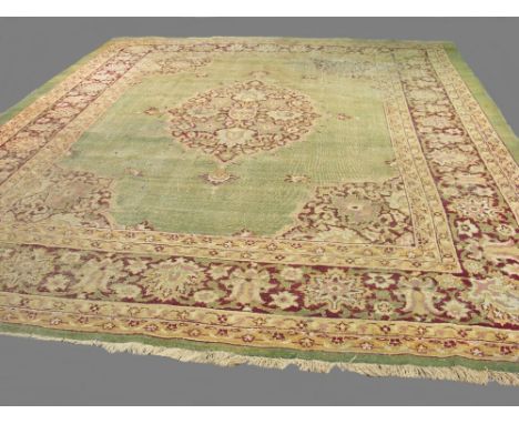 Rare C19th Indian Agra carpet, with all over light green ground with cream, beige and red patterned borders, 3.48x2.82m