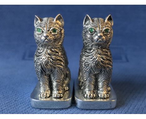 Pair of cat condiments stamped 800 Continental silver with emerald eyes