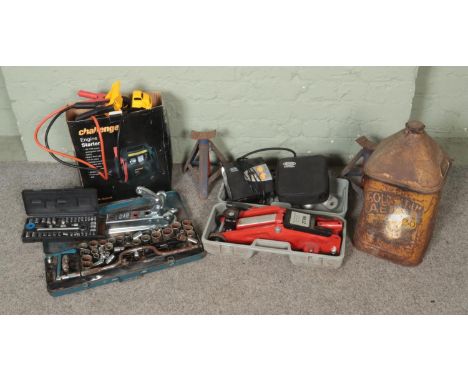 A quantity of car related tools and equipment including engine starter, socket sets, oil can, vehicle jack  