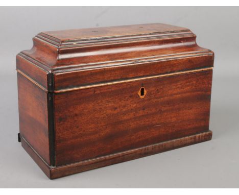 A 19th century mahogany tea caddy.  For restoration.