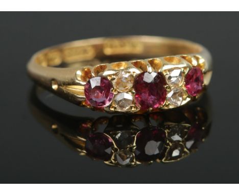 A late Victorian 18ct Gold Ruby and Diamond ring. Assayed Birmingham, 1896. Size O½. Total weight: 3.1g.  