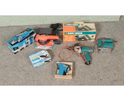 A collection of mostly Black and Decker power tools to include plane, sander, grinder, drill, etc.  