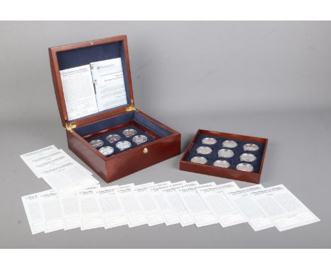 The Westminster Collection; A cased set of eighteen silver proof Gibraltar £5 coins, dated 2004 and 2005. Set number 566. Com