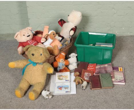 A wicker basket of vintage teddy bears along with an assortment of vintage books to include Little Women, Winnie The Pooh, Ha