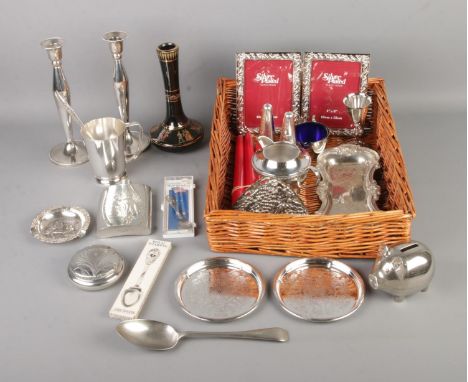 A tray of mostly assorted silver plate and pewter items to include candle sticks, photo frame, embossed hip flask, etc. Along