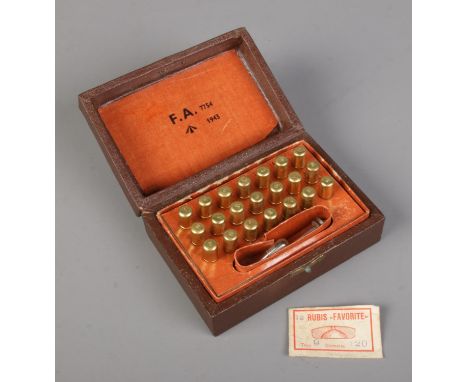A Second World War era watchmakers drill bit set; F.A. 7754, bearing military broad arrow mark and dated for 1943. In hinged 