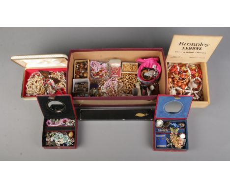 A tray containing a large collection of assorted jewellery. To include wristwatches, fan, bangle set with turquoise coloured 