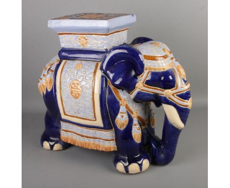 A large ceramic ceremonial Indian elephant plant stand.  