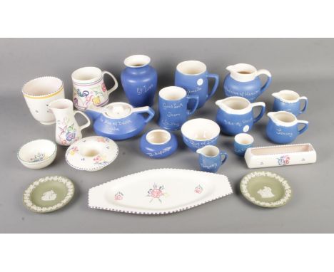 A collection of ceramics to include Poole pottery, Wedgwood and group of blue and cream Devonware.  