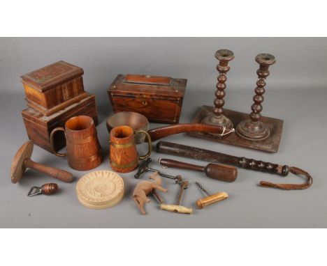 A quantity of wooden collectables including tea caddy, candlesticks, ladle, tankards etc  