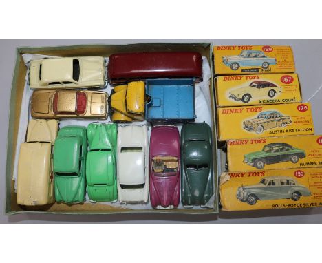 A Dinky Austin A105 Saloon No. 176, four other boxed Dinky vehicles and 10 unboxed vehicles, including Rolls Royce Silver Wra