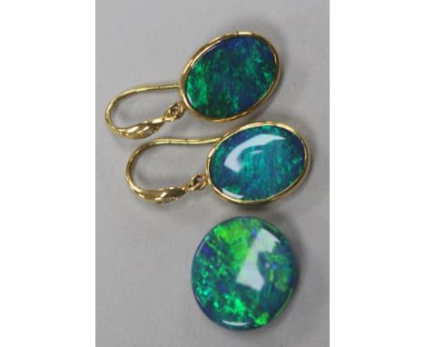 A pair of 18ct gold, black opal and diamond oval drop earrings and an unmounted black opal.