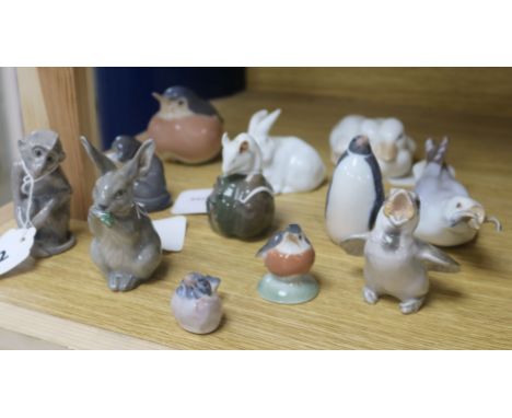 Eleven Royal Copenhagen and Bing & Grondahl models of animals, including Mouse on green chestnut (No. 511), Robin (No. 2266),