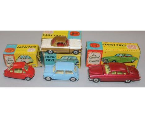A Corgi Toys Jaguar Mark X No. 238 (cerise) and three other boxed Corgi cars, including Triumph Herald Coupe No 231, Heinkel 