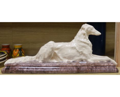 J. Merculiano (French, 1911). A model of Afghan hound, signed