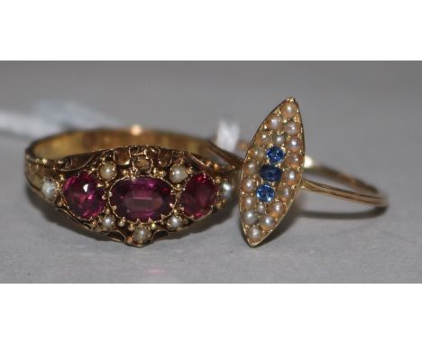 A Victorian 15ct gold, garnet and seed pearl dress ring and a gold, sapphire and seed pearl set marquise shaped ring.