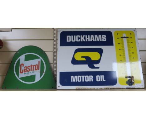 A Castrol Motor Oil and a Duckhams enamel sign