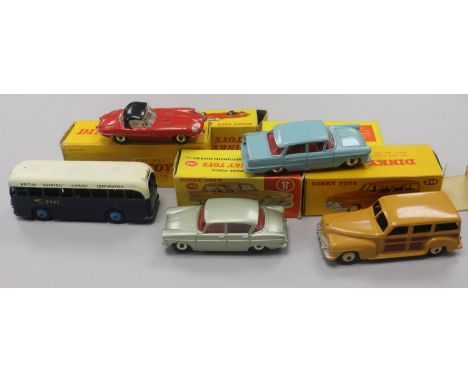 A Dinky Opal Kapitan No. 177 and four other boxed Dinky cars, including Jaguar E-Type No, 120, Singer Vogue No. 145, B.O.A.C.