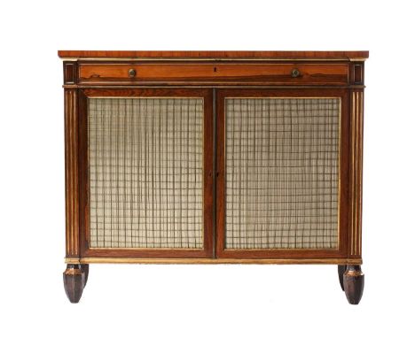 An early 19th century crossbanded rosewood chiffonier, the top with satinwood strung and crossbanded decoration above a pair 