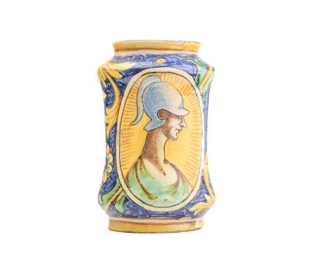 An Albarello dry drug jar, of waisted form, with figural yellow panels within floral scroll borders on a blue ground, 22 cm h
