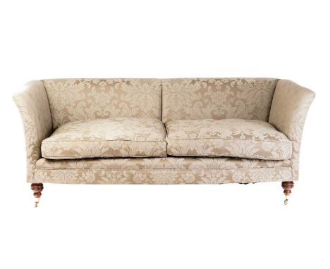 A Victorian-style two-seat high-backed sofa, 20th century, with celadon green Damask style stuff over upholstery, supported b