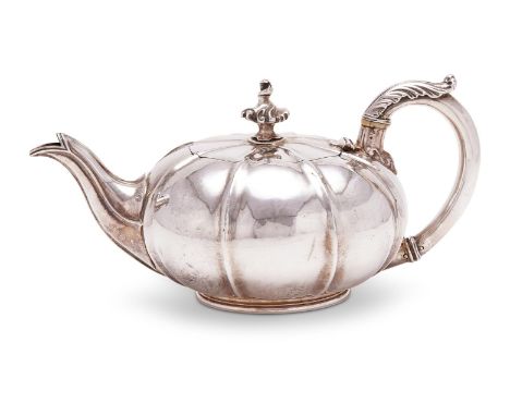 Y A William IV silver melon shaped tea pot by Paul Storr, London 1831, stamped Storr & Mortimer, no. 114, with a flambeau fin