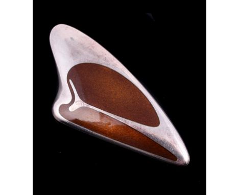 An abstract enamelled brooch by Henning Koppel for Georg Jensen, No. 314, the shaped triangular brooch with shaded brown enam