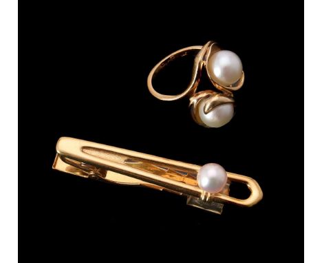 A cultured pearl tie pin by Mikimoto, the pierced polished and textured bar with a single cultured pearl accent, stamped K18 