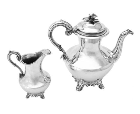 Y An early Victorian silver baluster coffee pot and cream jug by Charles Fox II, London 1838, the coffee pot with a flower fi