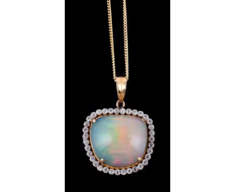 An opal and diamond cluster pendant, the cabochon opal within a surround of brilliant cut diamonds, approximately 0.68 carats