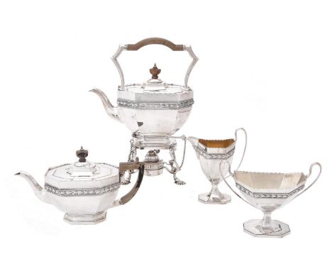 A silver matched four piece octagonal tea set by Edward Barnard & Sons Ltd., London 1919, the sugar bowl by Pearce & Sons, Lo