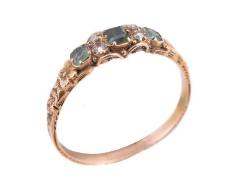 An early Victorian emerald and diamond ring, circa 1850, the three graduated step cut emeralds with canted corners interspace