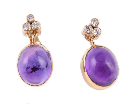 A pair of diamond and amethyst ear pendants, the oval cabochon amethyst drops in collet settings, with a trefoil of brilliant