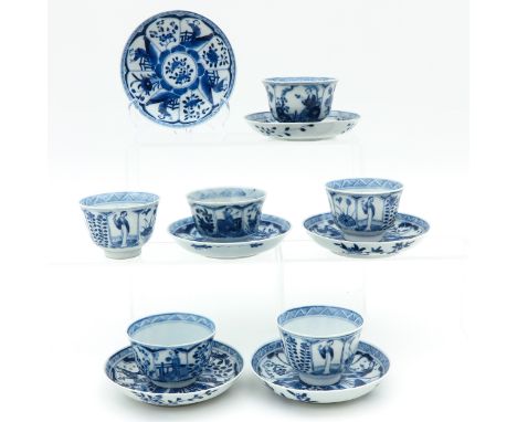 Depicting Chinese figures and florals, including Kangxi mark, saucers are 12 cm. in diameter, chip and hairline.