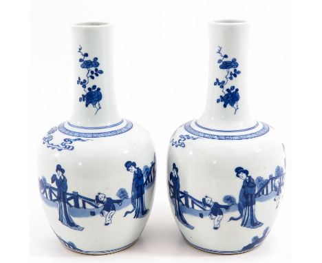 Depicting Chinese ladies with boys in garden, Kangxi mark, 28 cm. tall. 