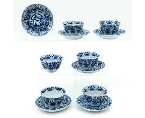 Floral decor, Kangxi mark, largest saucer is 12 cm. in diameter, chip and hairline.