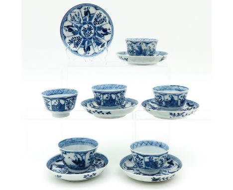 Deocrated with Chinese figures and florals, saucers are 13 cm. in diameter.