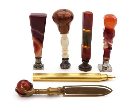 Consisting of 4 wax stamps partly with handles of amber carnoline and ivory added paper clip and mechanical pencil longest 10