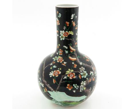 Decorated with flower blossoms and birds, marked Kangxi, 36 cm. tall, light scratches in glaze.