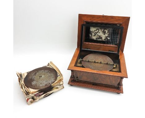 With beautiful marquetry in the lid  50 x 26 x 38 cm.  also added is  a large collection of playing plates