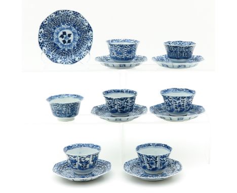 Floral decor, Kangxi mark, saucers are 13 cm. in diameter.