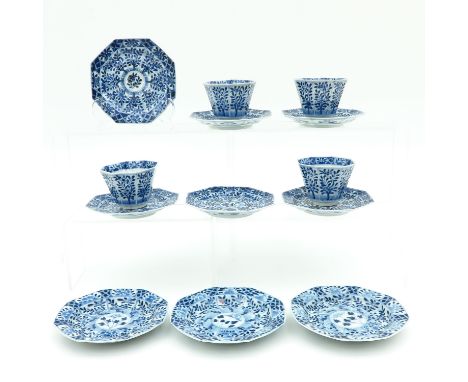 Including 4 cups and 9 saucers, floral decor, saucers are 13 cm. in diameter, hairline.