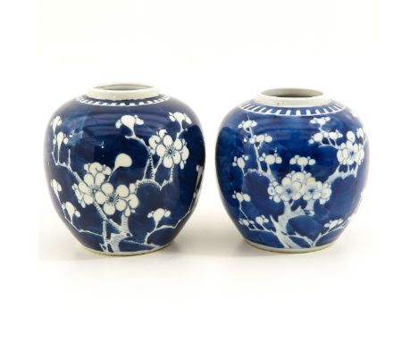 Dark blue ground with white blossom decor, Kangxi mark, 13 cm. tall. 