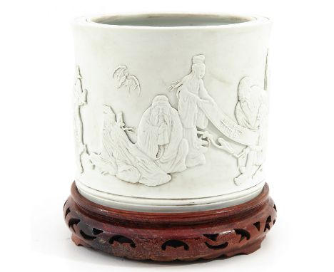 Decorated with Chinese figures, marked with incised seal mark on bottom, 17 cm. tall including wood base. 