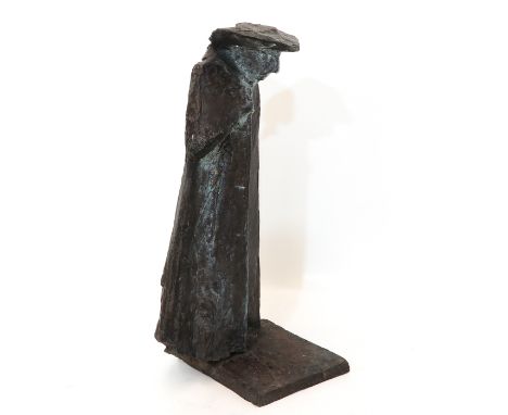 By Eric Claus  depicting a walking man with hat and cloak  exceptionally high  80 cm.