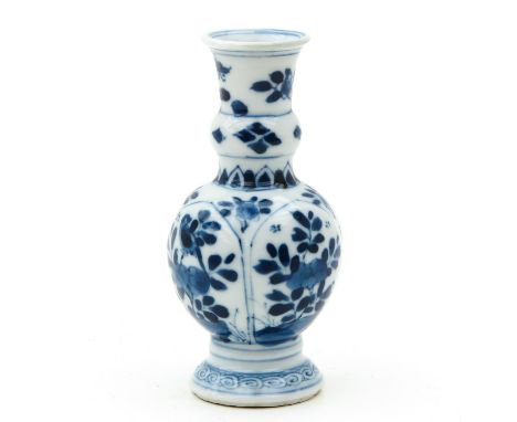 Kangxi Period, blue and white floral decor, 11 cm. tall. 